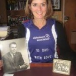 Jane Lizotte with photo of her father Supreme Court Justice Francis P. O'Connor
